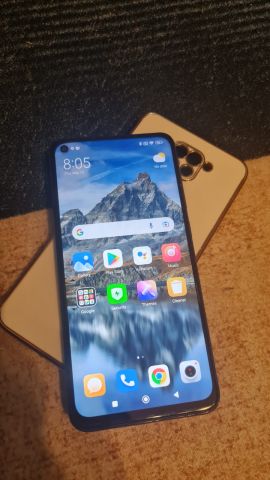 موبايل شاومي ريد مي نوت ٩ بحاله ممتازه جدا بالشاحن والحراب ٦٤ ج 2