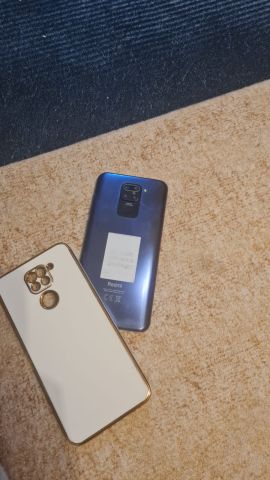 موبايل شاومي ريد مي نوت ٩ بحاله ممتازه جدا بالشاحن والحراب ٦٤ ج 4