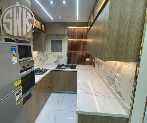 مطابخ خشب poly lac في SAFETY WOOD للمطابخ والدريسنج روم 