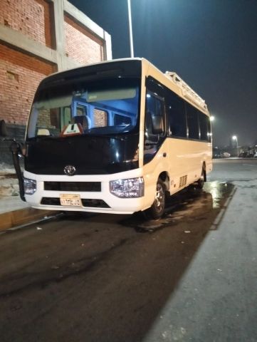 Book Now Toyota Coaster Airport Transfer with Driver to Hilton Ca
