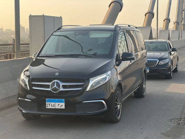 Car rental Mercedes V300 model 2026 with a professional driver 