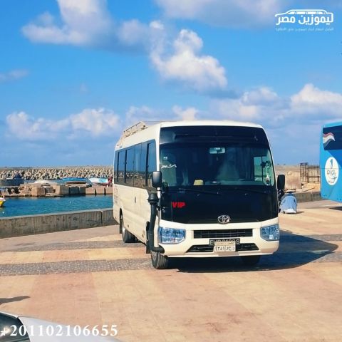 ? Toyota Coaster 30-Seater Rental with Chauffeur | Mohandessin t